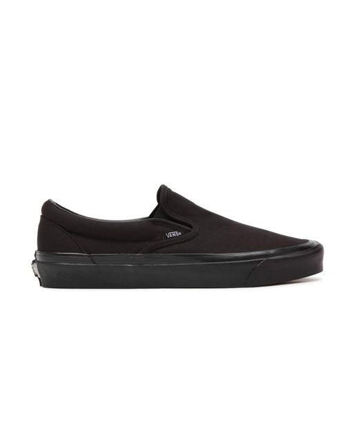 vans slip on total black