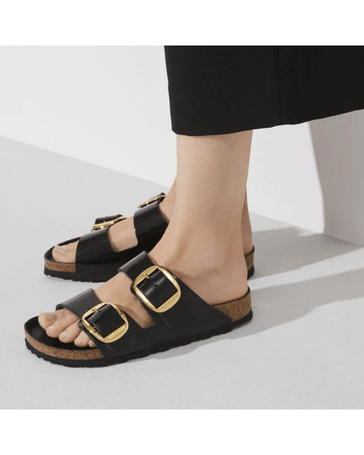 black birkenstocks with black buckle