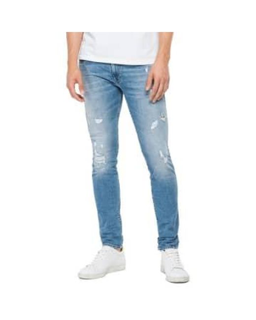 Replay Anbass 573 bio slim fit jeans hellblau rip repair in Blue für Herren
