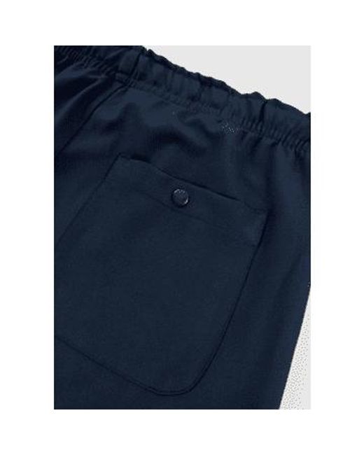 Train la marine b pantalon Loreak pour homme en coloris Blue