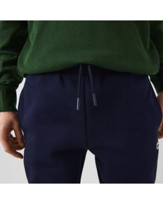 Pantalon survêtement Slim Fit en molleton coton biologique Lacoste pour homme en coloris Blue