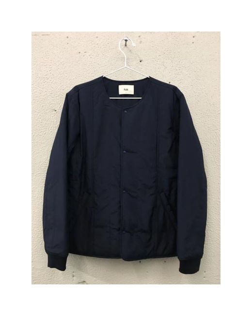 navy blue collarless jacket