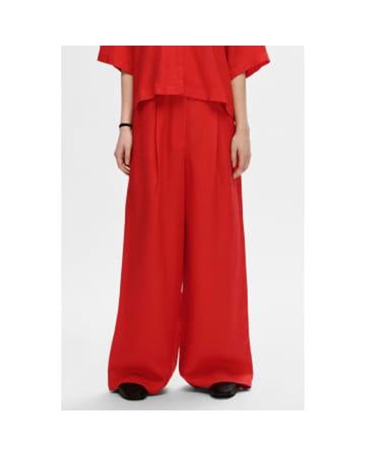Pantalones lino anchos llama scarlet lyra SELECTED de color Red