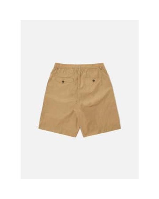 Universal Works Natural Pleated Track Short for men