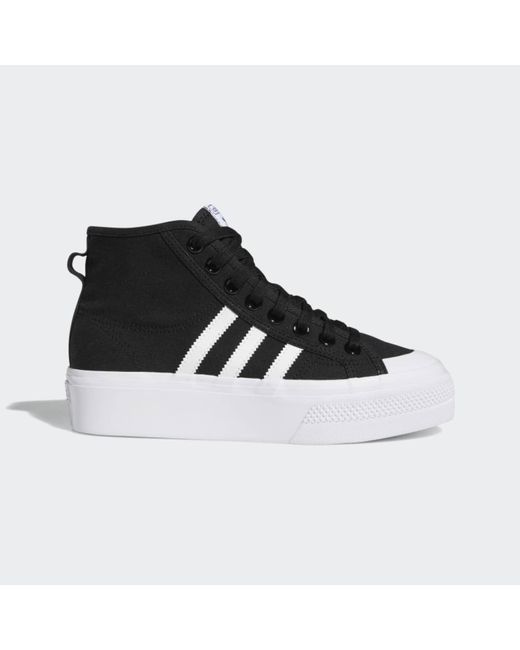black adidas nizza platform