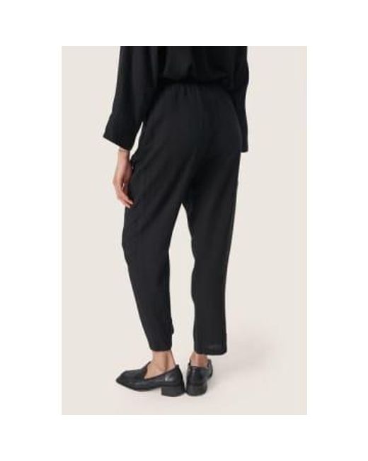Pantalon noir slvinda Soaked In Luxury en coloris Black