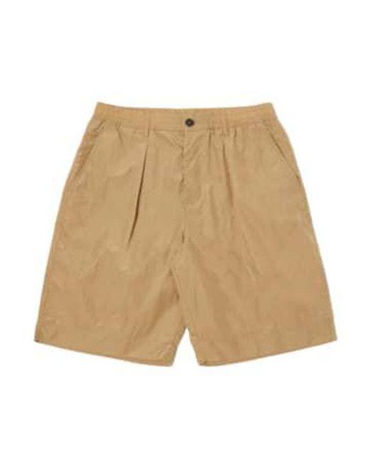 Universal Works Natural Pleated Track Short for men