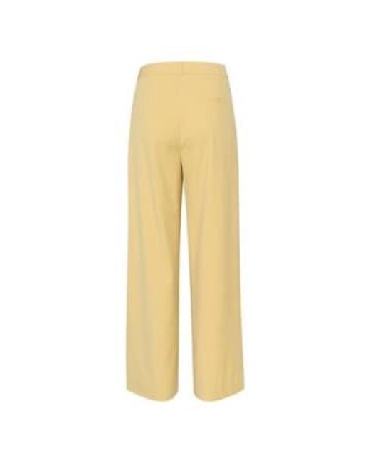 Pantalon large pantalon paula Gestuz en coloris Yellow