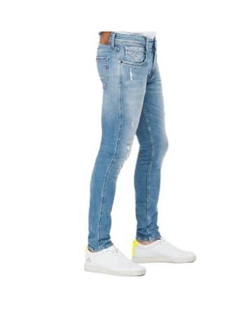Replay Anbass 573 bio slim fit jeans hellblau rip repair in Blue für Herren