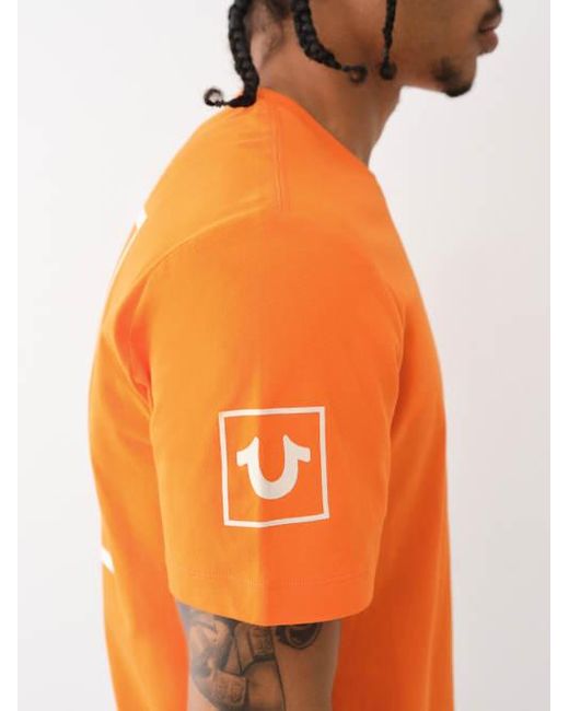 True Religion Orange Flocked Horseshoe Logo Tee for men