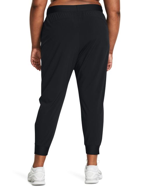 Pantaloni armoursport high-rise woven di Under Armour in Black