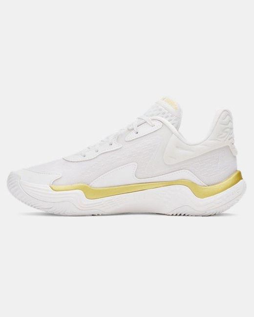 yellow and white basketball shoes