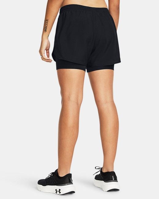 Short 2 En 1 Fly By Pour Femme Réfléchissant Under Armour en coloris Blue