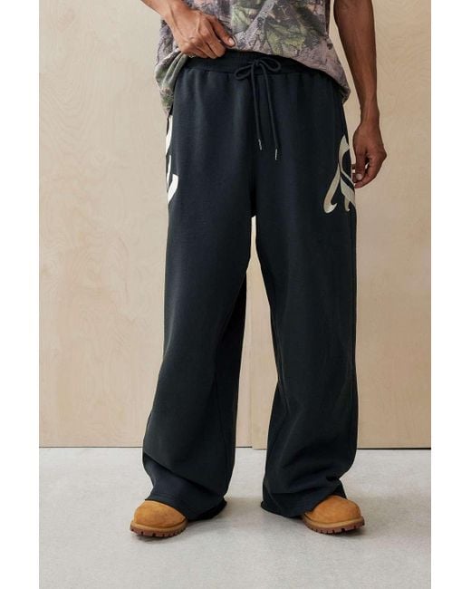 Ed Hardy Blue Uo Exclusive Wrap Embroidered Joggers for men