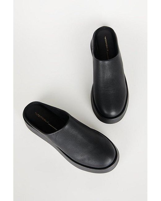 INTENTIONALLY ______ Black Risen Leather Platform Mule