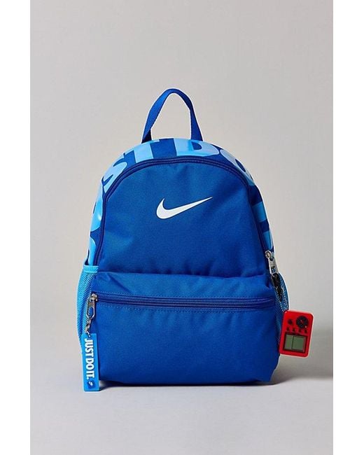 blue mini nike backpack Kids, Kids, Brasilia Just Do It (11L) (Little Kid/Big Kid), Hydrangeas/Glacier Blue/Glacier Blue, One-Size Padded shoulder straps are adjustable for a comfortable fit Nike JDI mini backpack with