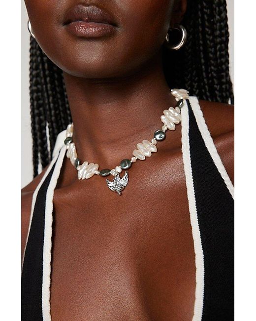 Urban Outfitters Brown Pearl Cherub Statement Necklace