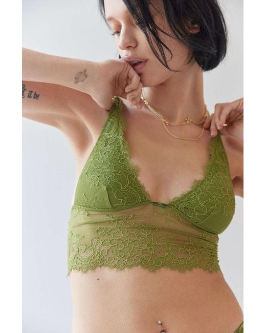 https://cdna.lystit.com/520/650/n/photos/urbanoutfitters/10cc6ace/out-from-under-Light-Green-Charlotte-Butterfly-Kisses-Bralette.jpeg
