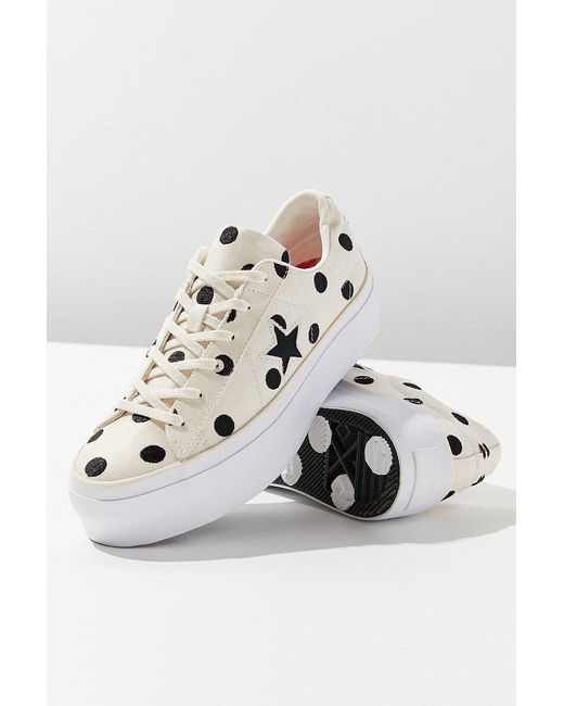 black spotty converse
