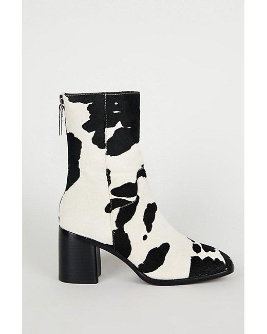 INTENTIONALLY ______ Black Pg Cow Print Boot