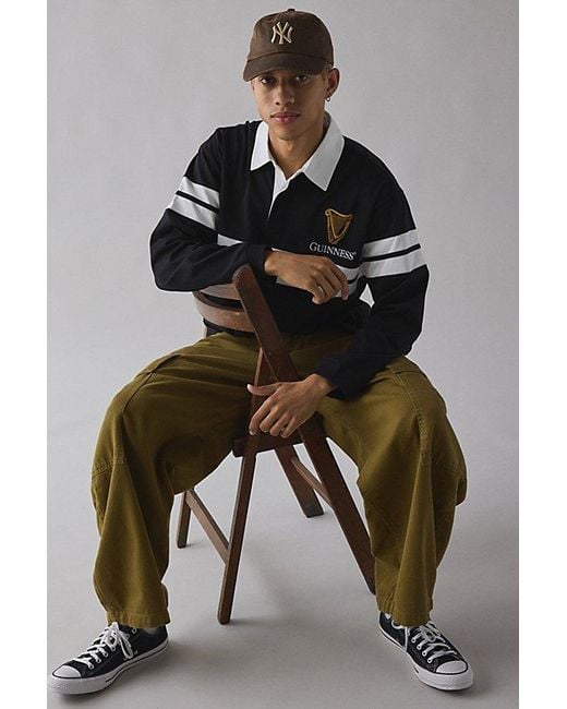 Urban Outfitters Black Guinness Embroidered Logo Rugby Shirt Top for men