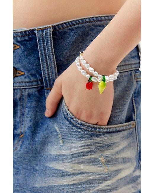 Urban Outfitters Blue Glass Fruit And Pearl Charm Bracelet Set