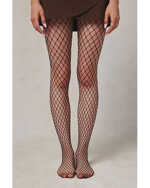 Urban Outfitters Natural Uo Fishnet Tights