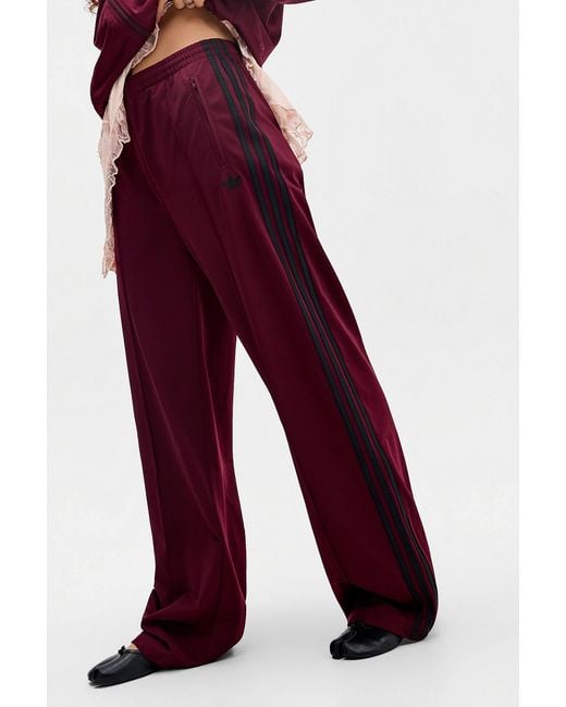 Adidas Originals Red Adidas Burgundy Firebird Loose Track Pants Xs At Urban Outfitters