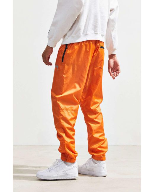 orange nike windbreaker pants