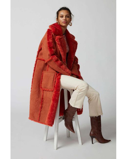 Kimchi Blue Red Willa Faux Shearling Maxi Jacket In Orange,at Urban Outfitters