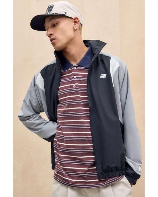 New Balance Blue Black Woven Track Jacket for men