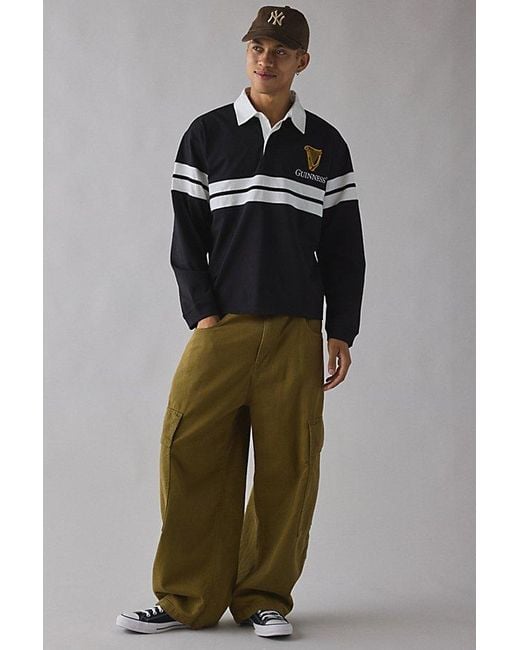 Urban Outfitters Black Guinness Embroidered Logo Rugby Shirt Top for men