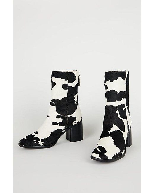 INTENTIONALLY ______ Black Pg Cow Print Boot