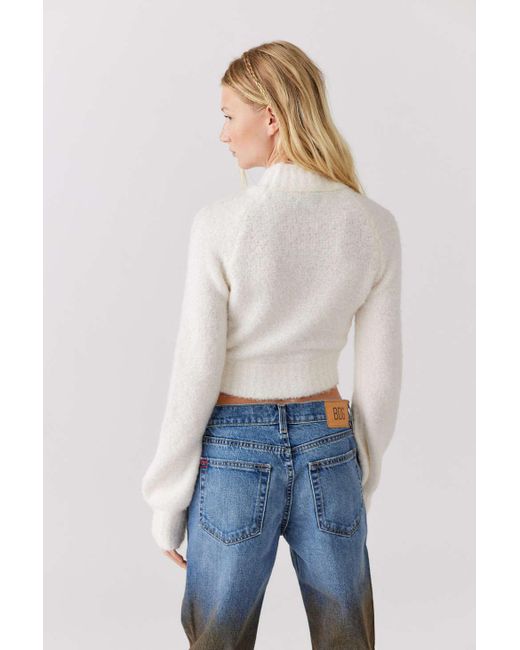 white cropped mock neck sweater