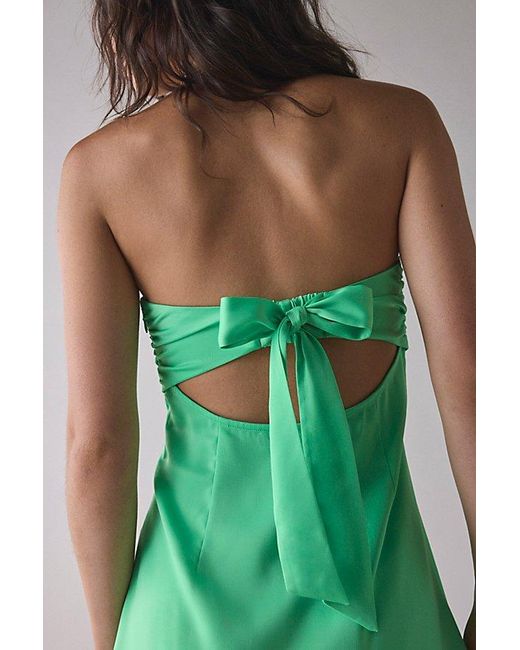 uo mira strapless tie back bow satin slip mini dress Urban Outfitters UO Mira Strapless Tie-Back Bow Satin Slip Mini Dress
