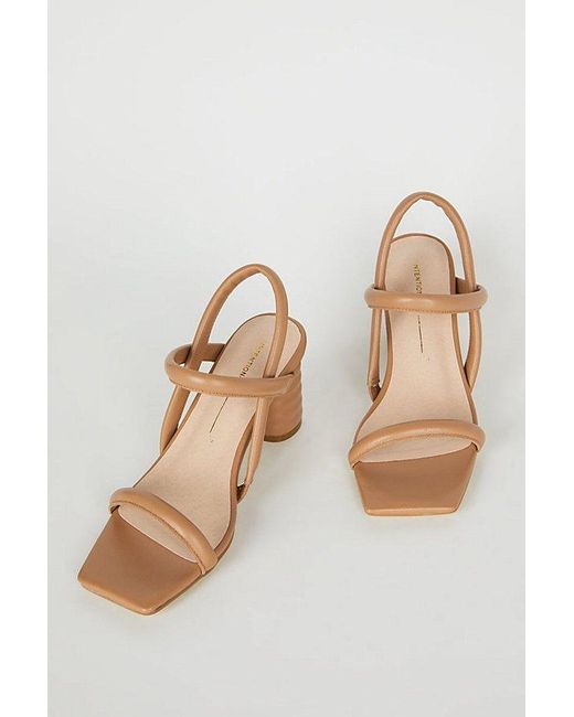 INTENTIONALLY ______ Natural Kifton Leather Heel