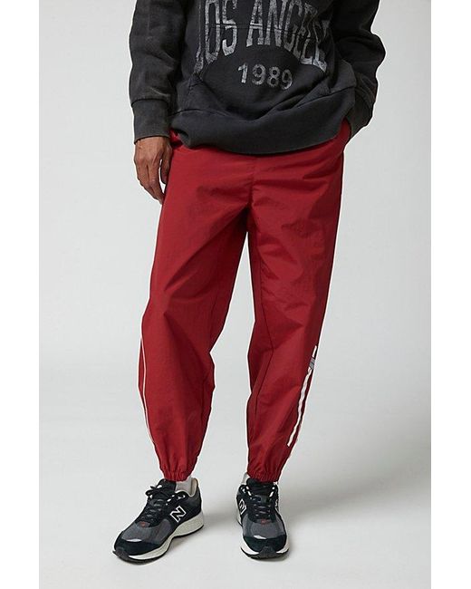 Urban Outfitters Red Uo Baggy Shell Nylon Pant for men