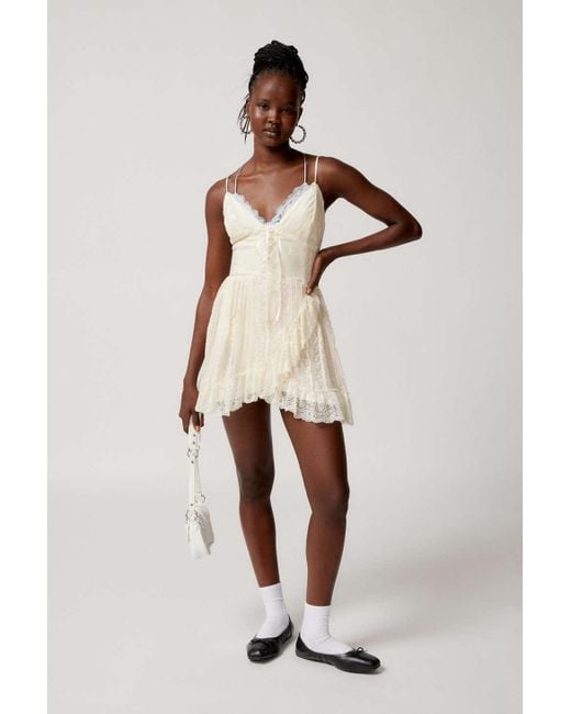 chinese dress ladies IVORY WHITE RIBBED KNIT LACEUP SLEEVELESS SWEATER MINI DRESS – MYSTYLEMODE main image 1