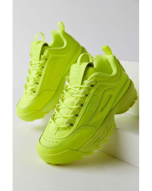 neon yellow fila shoes