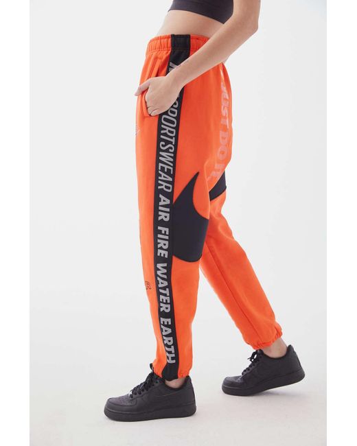 Nike Element Sweatpant in Orange | Lyst