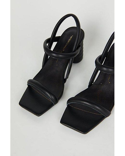 INTENTIONALLY ______ Black Kifton Leather Heel