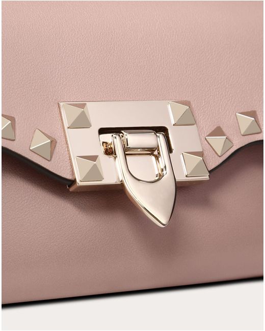 mini rockstud calfskin crossbody bag
