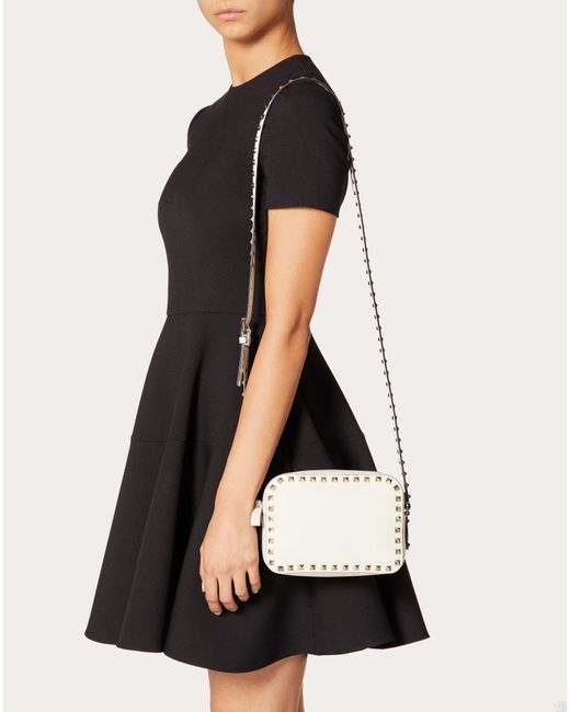 small rockstud grainy calfskin crossbody bag