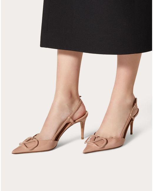 nude patent leather slingbacks
