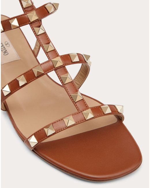 rockstud calfskin ankle strap flat sandal