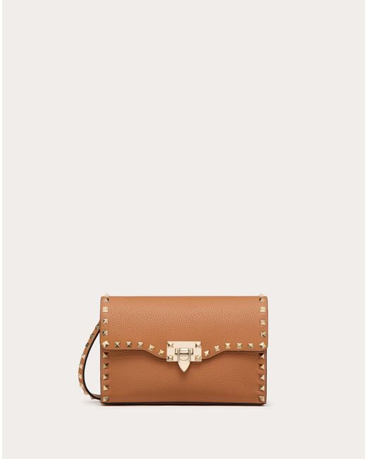 Small rockstud calfskin crossbody bag hotsell