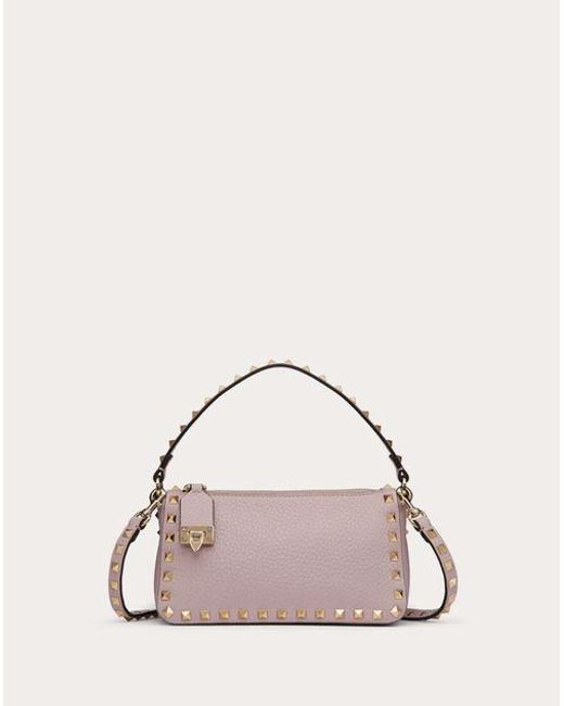 pink valentino bag with studs