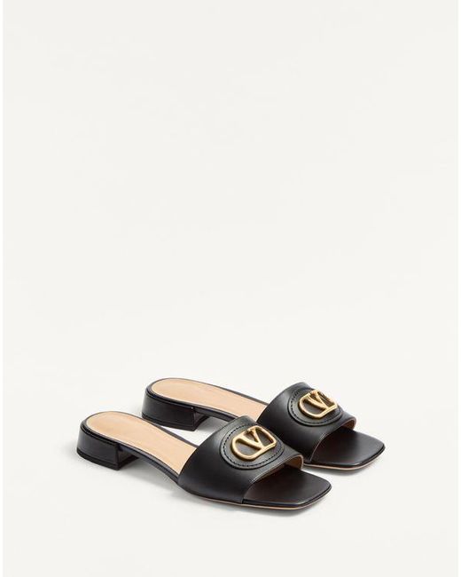 Valentino Garavani Vロゴ シグネチャー カーフスキン スライドサンダル 20mm 女性 ブラック White