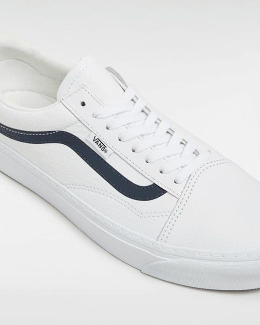 white leather old skool vans with black stripe