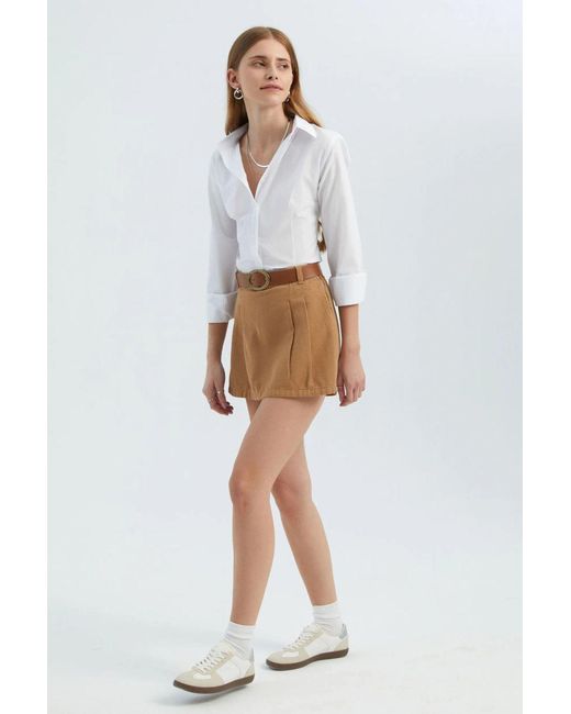 Hiccup White Mid Rise Pleated Mini Skirt With A Belt